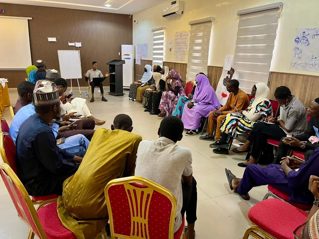 Participants seated in a circle during the three-day Training of Trainers on youth leadership in emergencies at Rod Bola Suite, Maiduguri