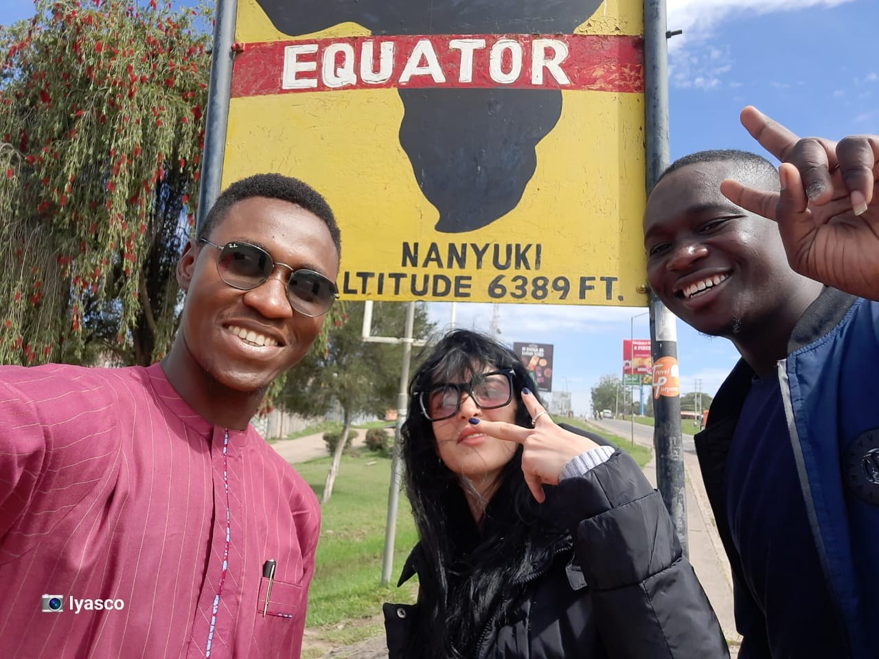 Participants beside the Equator landmark in Nanyuki, Kenya, in 2023