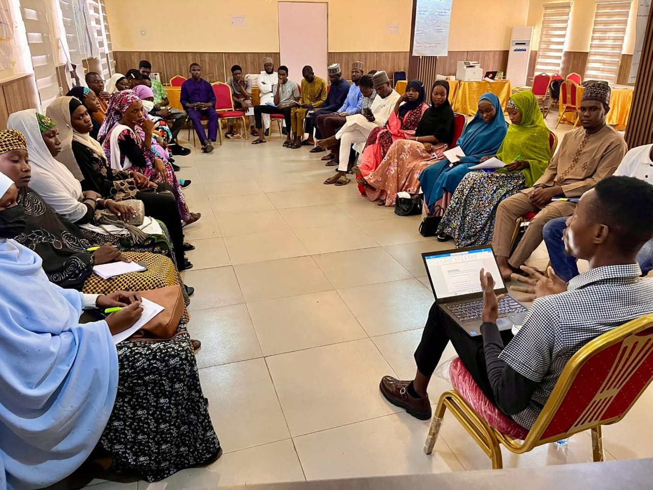 Iyasco Jeremiah facilitating the self-care and collective care session at the Training of Trainers on youth leadership in emergencies, Rod Bola Suite, Maiduguri