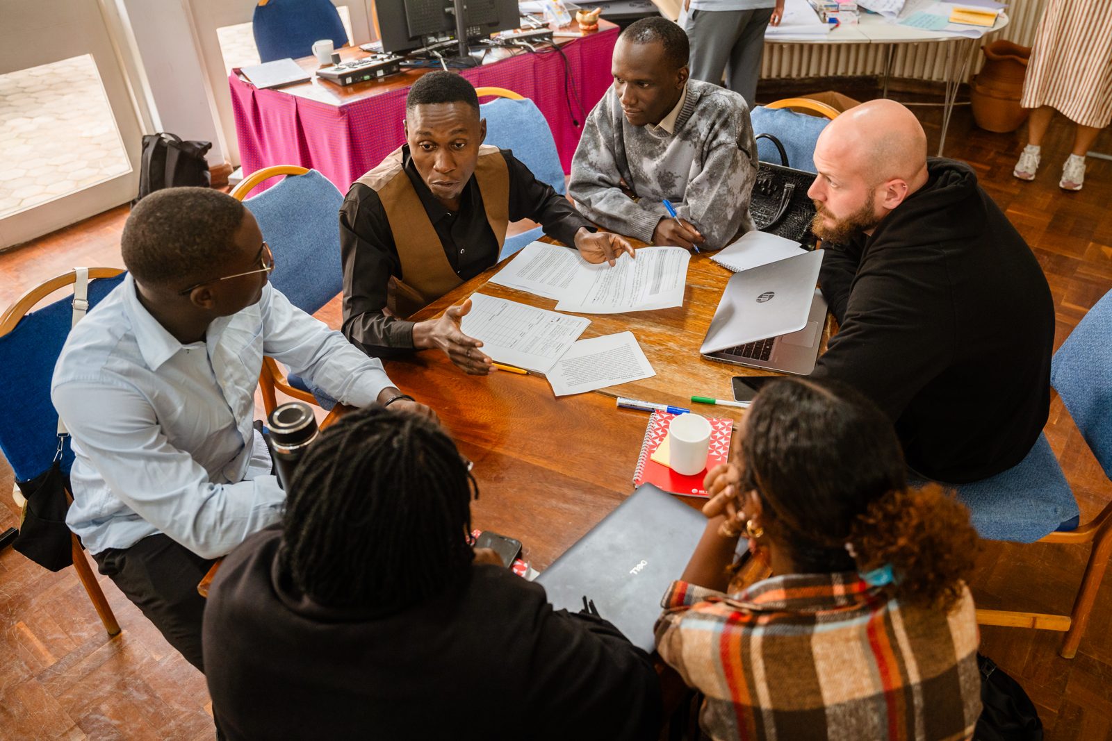 Participants collaborating during the Youth Leadership in Emergencies ToT at MS-TCDC, Arusha